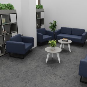 Modern office waiting area with blue sofas, white coffee tables, and decorative plants for professional, inviting reception spaces.